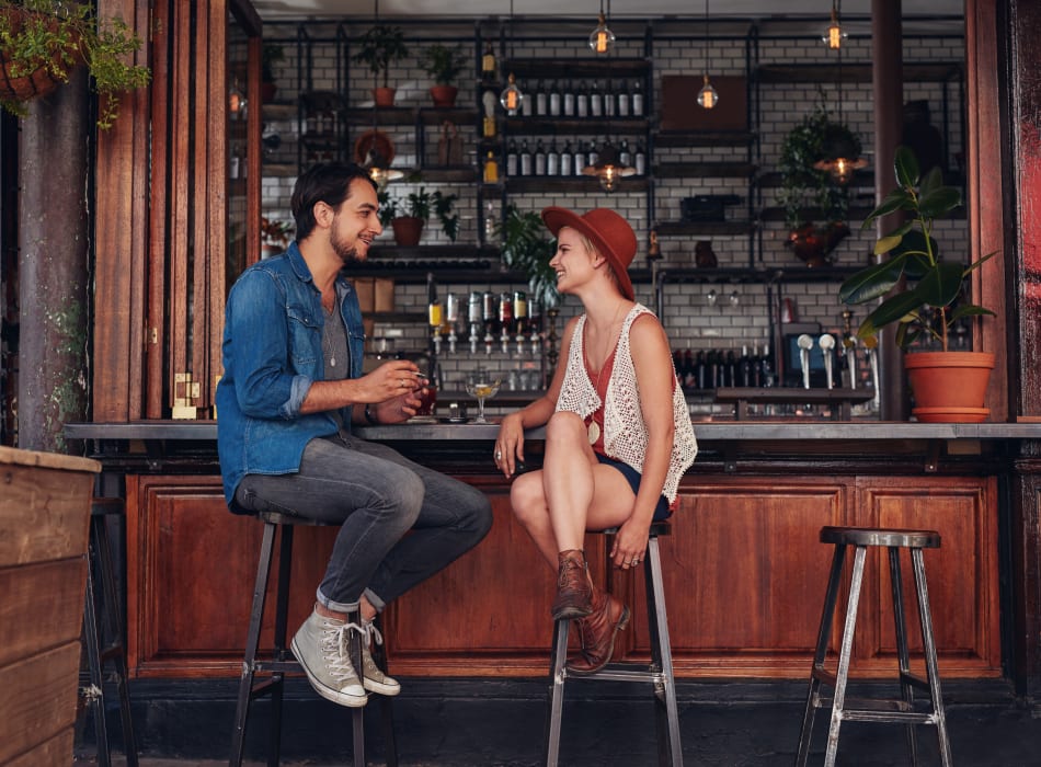 Residents chatting at locals' favorite bar near Sofi at 50 Forest in Stamford, Connecticut