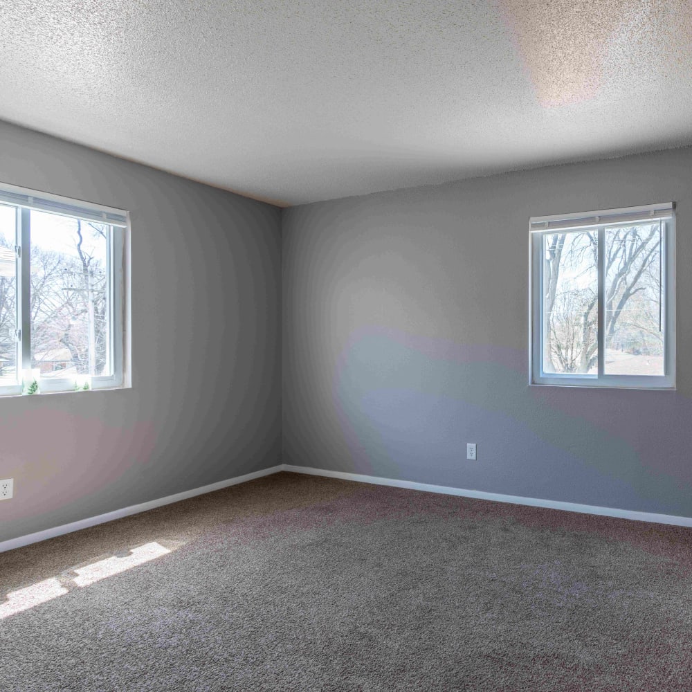 Brightly lit bedroom at Dickinson Apartments in Springfield, Illinois