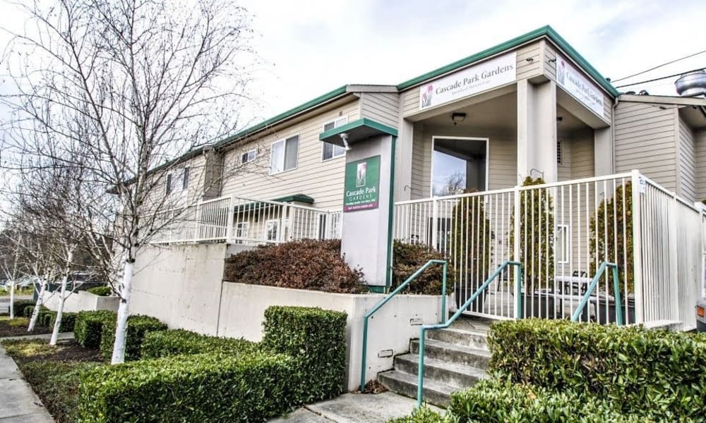 Exterior of our community on a beautiful day at Cascade Park Gardens Memory Care in Tacoma, Washington