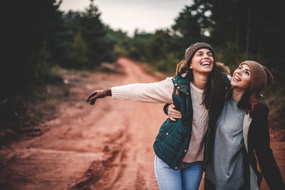 Two friends hiking near 301 Riverwalk Place in Buffalo Grove, Illinois