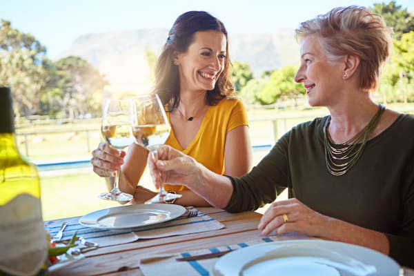 Women drinking wine near Avilla Centerra Crossings in Goodyear, Arizona