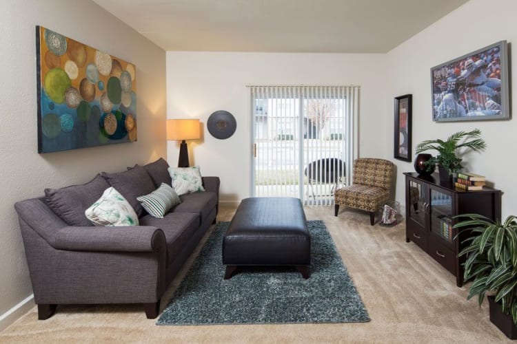 Well decorated living room at Crescent at Wolfchase home in Memphis, Tennessee