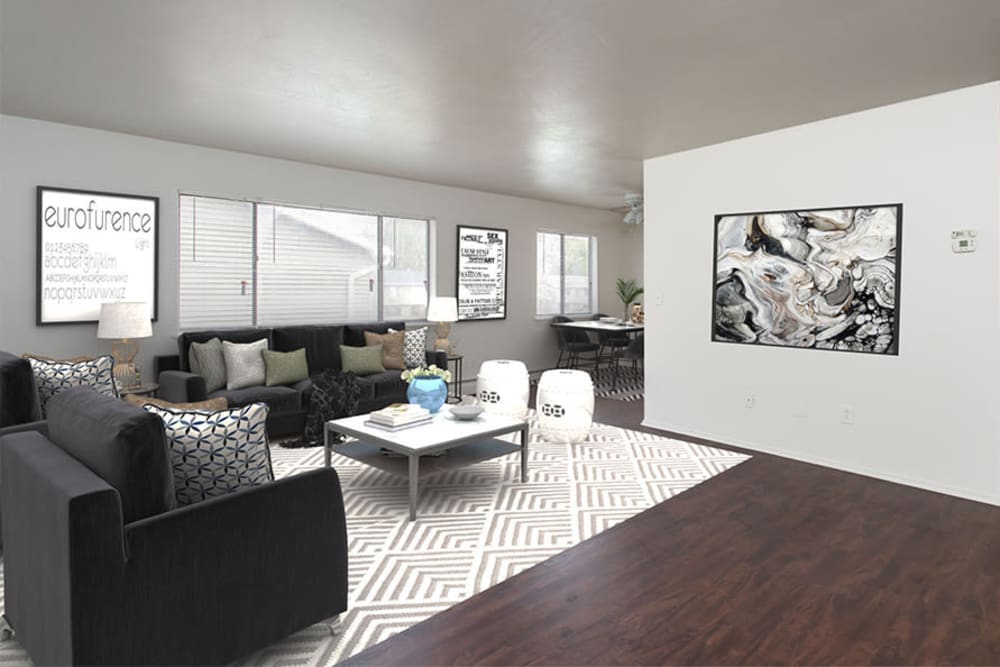 Living room with wood-style flooring at Lake Vista Apartments in Rochester, New York