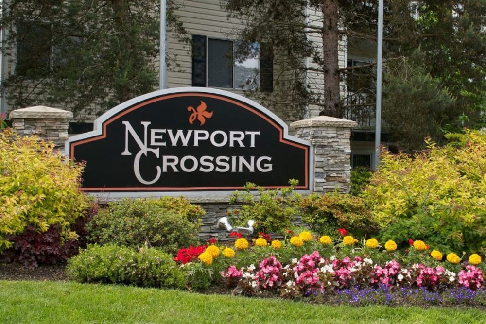 The front monument sign at Newport Crossing Apartments in Newcastle, Washington