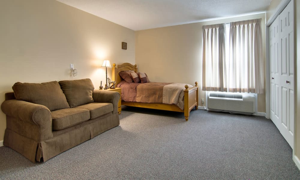 Large bedroom for assisted living residents at Dunsford Court in Sullivan, Missouri