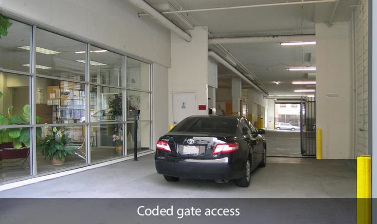 Car at coded gate access point at SOMA Self-Storage in San Francisco, California