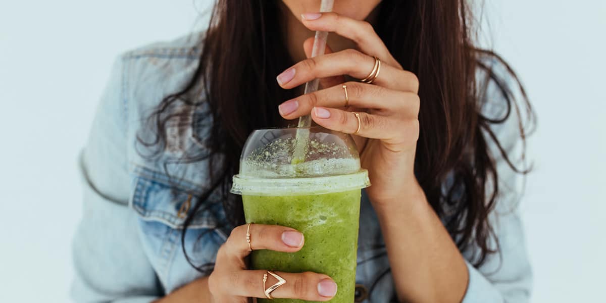Girl drinking a smoothie at The Copeland in Austin, Texas
