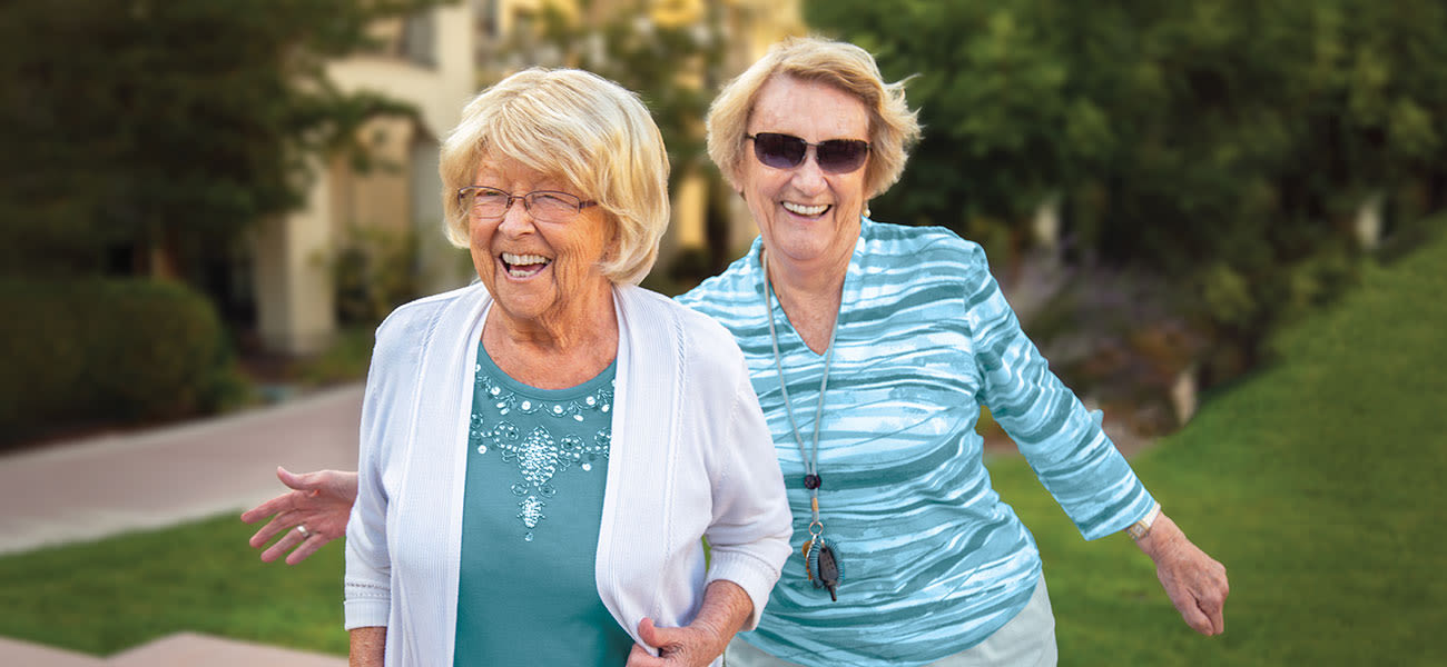 Two residents dancing at Merrill Gardens at Auburn in Auburn, Washington.