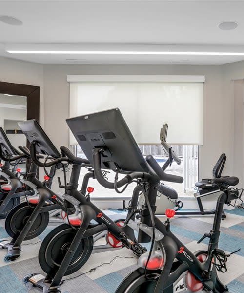 Spin bikes in the state-of-the-art fitness center at Briar Cove Terrace Apartments in Ann Arbor, Michigan