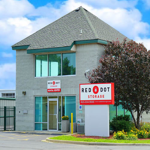 Exterior view of the office and storage units at Red Dot Storage in Woodstock, Illinois