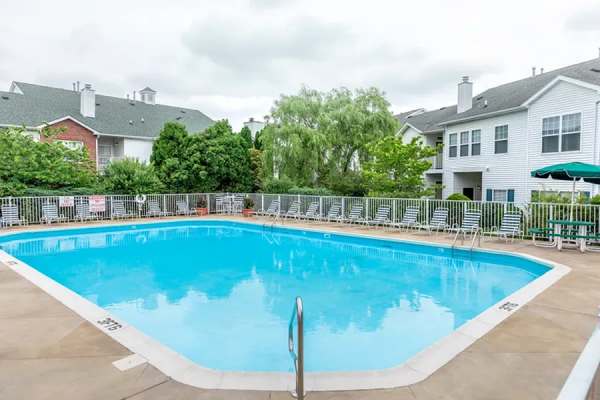 Saltwater swimming pool with lounge beds at Colts Run in Lexington, Kentucky