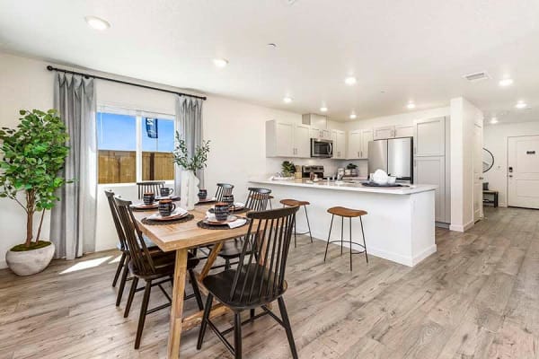 Kitchen with wood-style plank flooring at Isles in Roseville, California