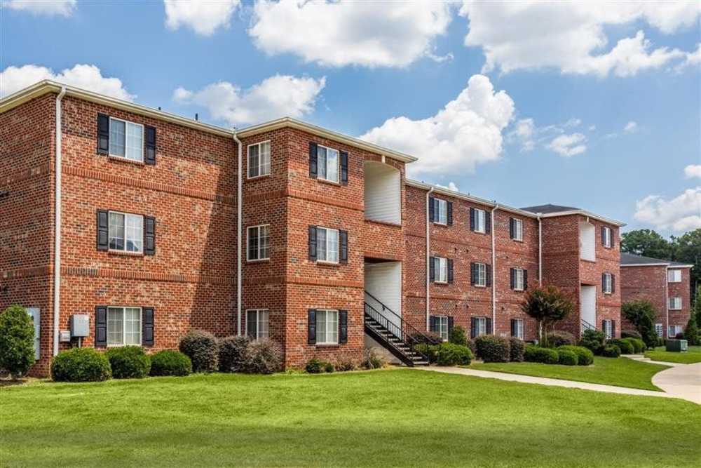 Outdoor view of apartment complex at Hidden Creek Village in Fayetteville, North Carolina