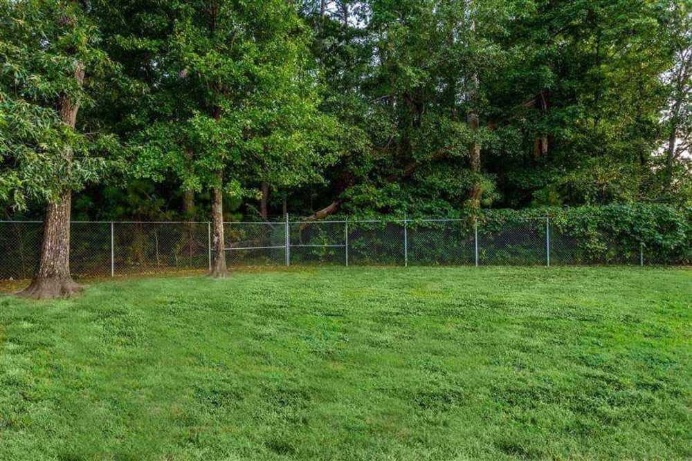 Grassy area at Hidden Creek Village in Fayetteville, North Carolina