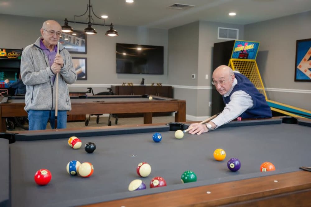 Residents playing pool at The Pinnacle in Plymouth Meeting, Pennsylvania