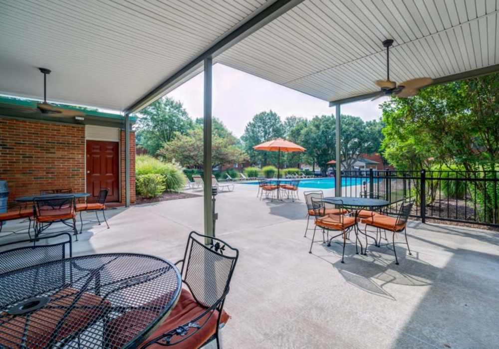 Picnic area beside swimming pool at Courtyard Apartments in Columbia,Missouri