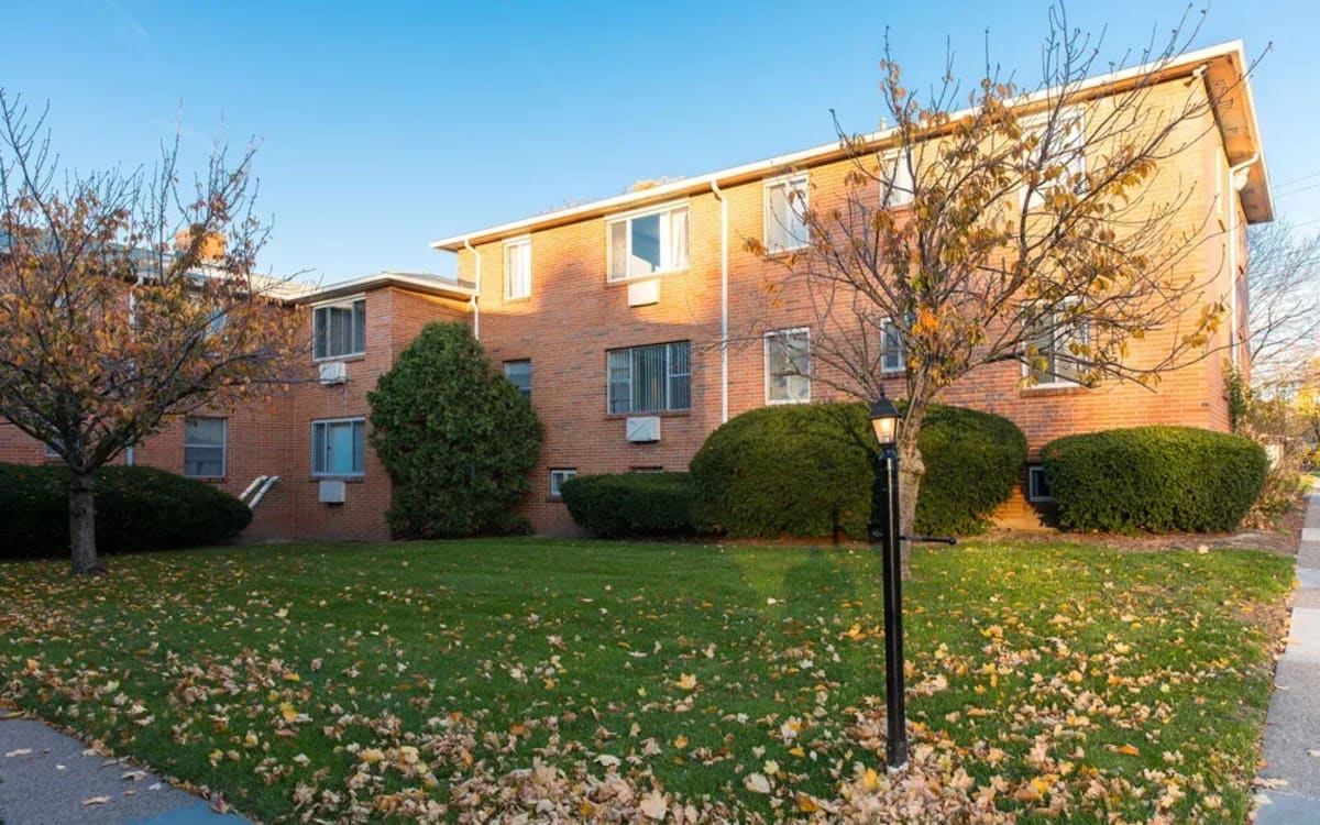 Exterior view of the apartment building at Highland Bay Apartments in Rochester, New York