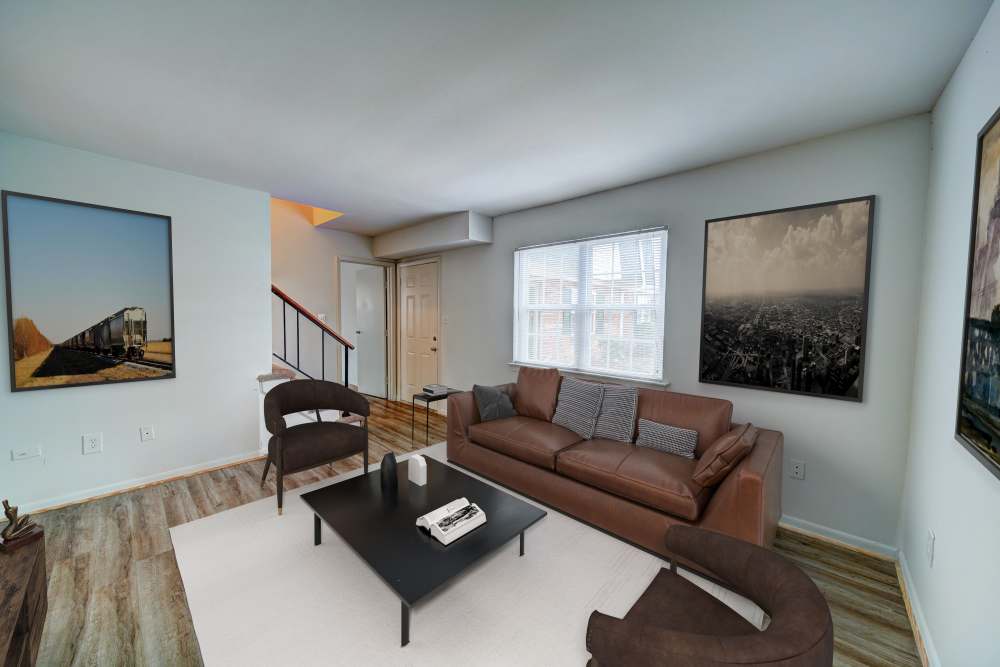 Well-furnished apartment living area at Hickory Point Townhomes in Newport News, Virginia