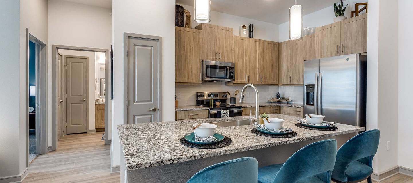 Model kitchen with island at Luxia Gallery House, Farmers Branch, Texas