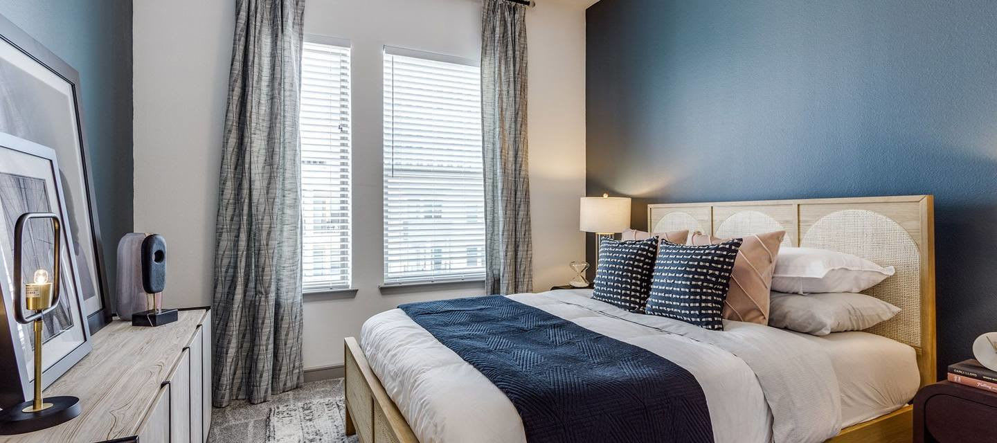 Model bedroom at Luxia Gallery House, Farmers Branch, Texas