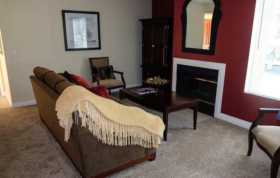 Living room with couch at Shadowridge Summerwind in Vista, California