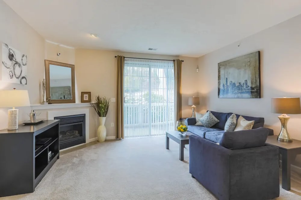 Spacious living room with fireplace at Berkley Manor in Cranberry Twp, Pennsylvania