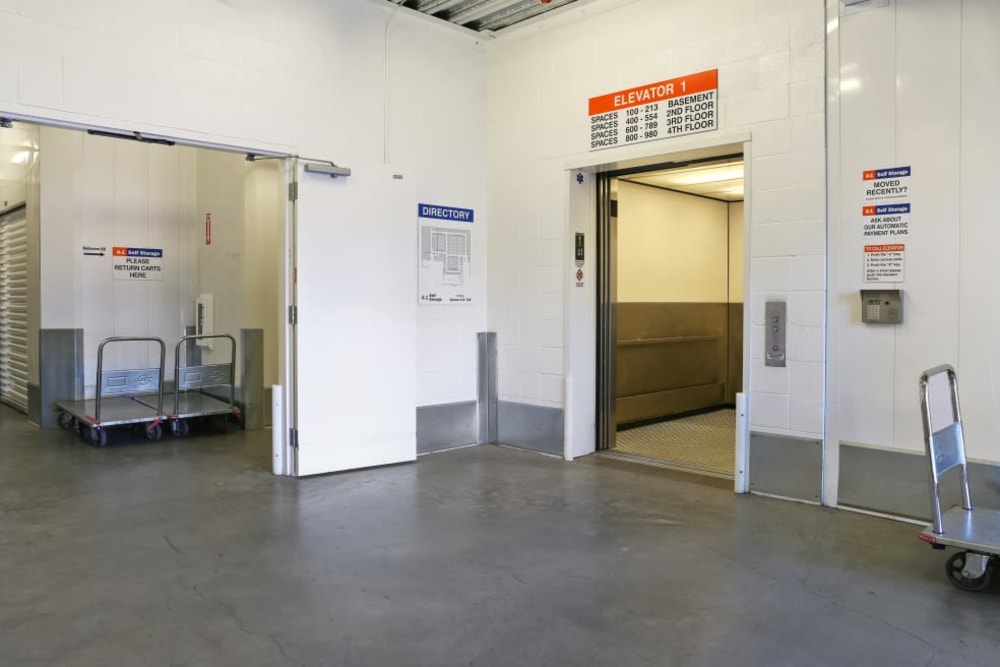 Carts and a freight elevator at A-1 Self Storage in Alhambra, California