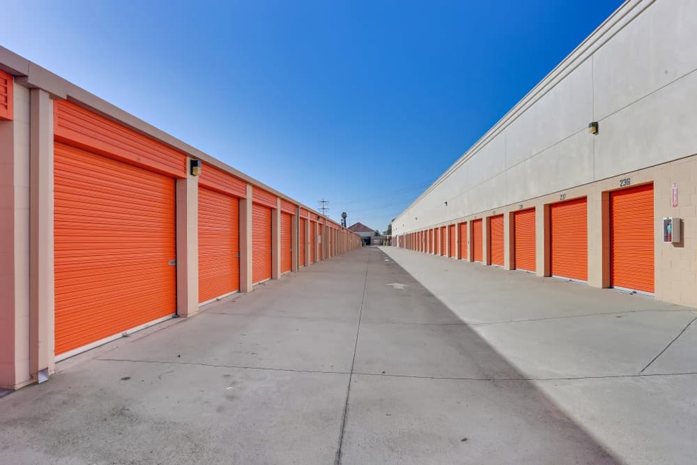 Outdoor storage units and a wide driveway at A-1 Self Storage in Santa Ana, California