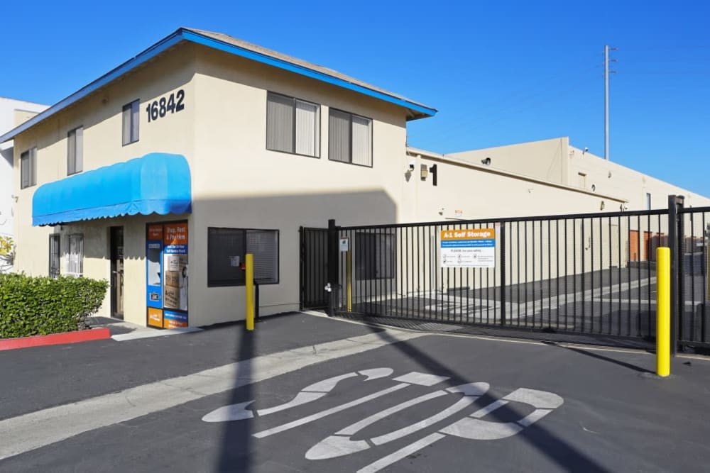 The front entrance and iron gate at A-1 Self Storage in Fountain Valley, California