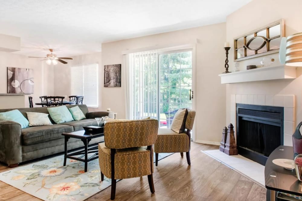 Model living room with wood style flooring at The Villas & St. Andrews at Little Turtle in Westerville, Ohio