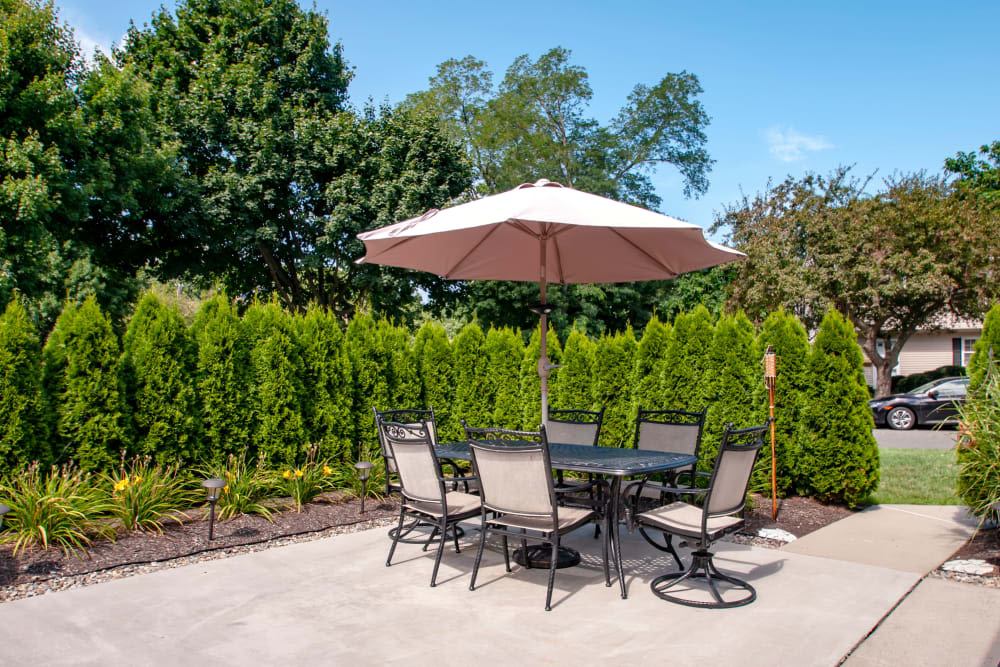 Sunny patio seating at Brandywyne East II in Brielle, New Jersey