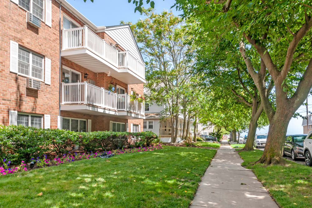 Greenery with walking path at Brinley Manor in Bradley Beach, New Jersey