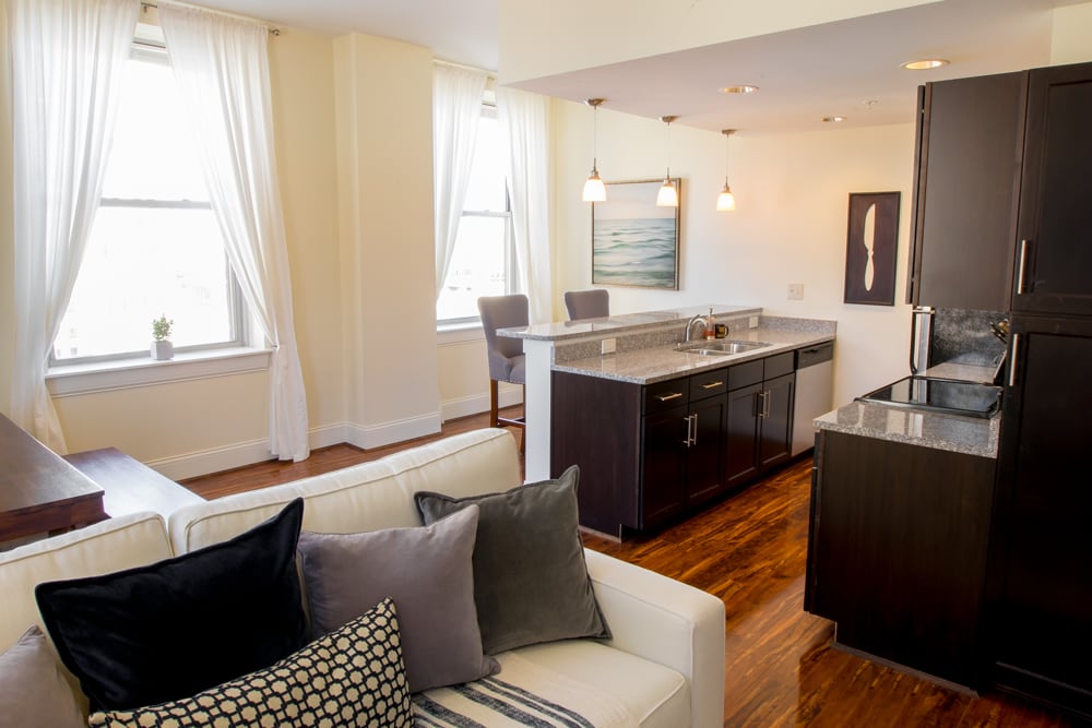 Abundant light through large windows are a feature in this living room at The Reserve at 4th and Race in Cincinnati, Ohio