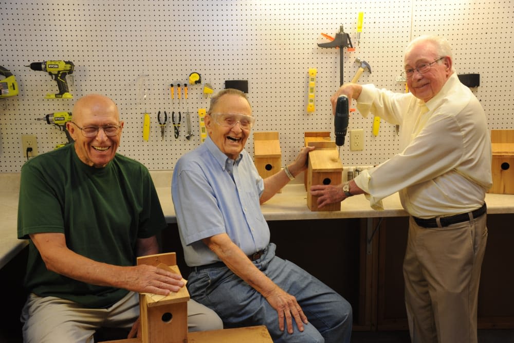 Residents doing woodworking at senior apartments at Arbour Square of Harleysville in Harleysville, Pennsylvania