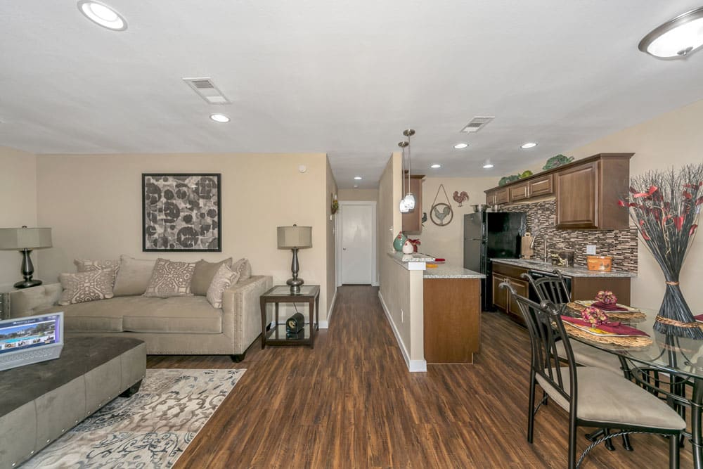 Open floor plan with living room and kitchen area at Buffalo Ranch in Farmersville, Texas