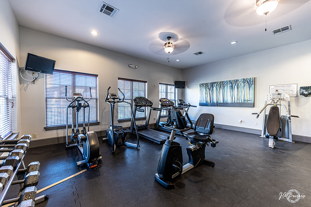 Cardio equipment and weights in fitness center at Blue Ridge in Midland, Texas