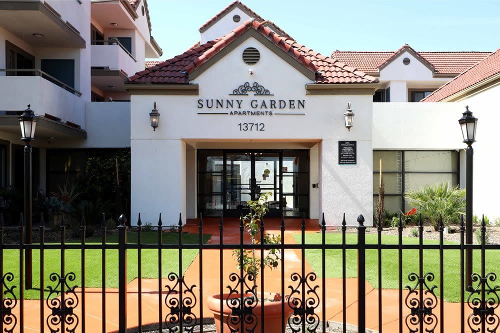 Welcoming entrance at Sunny Garden Apartments in La Puente, California