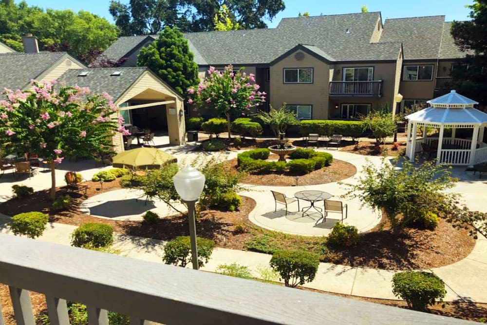 Sunny exterior courtyard at Blossom Vale Senior Living in Orangevale, California.