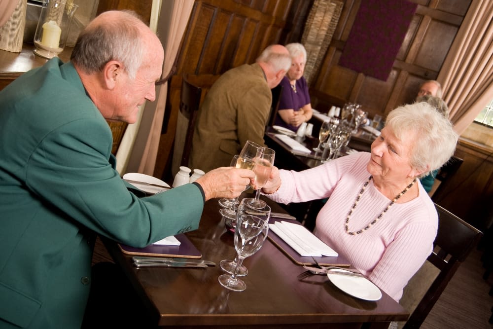 Two residents dining at The Iris Senior Living in Great Falls, Montana. 