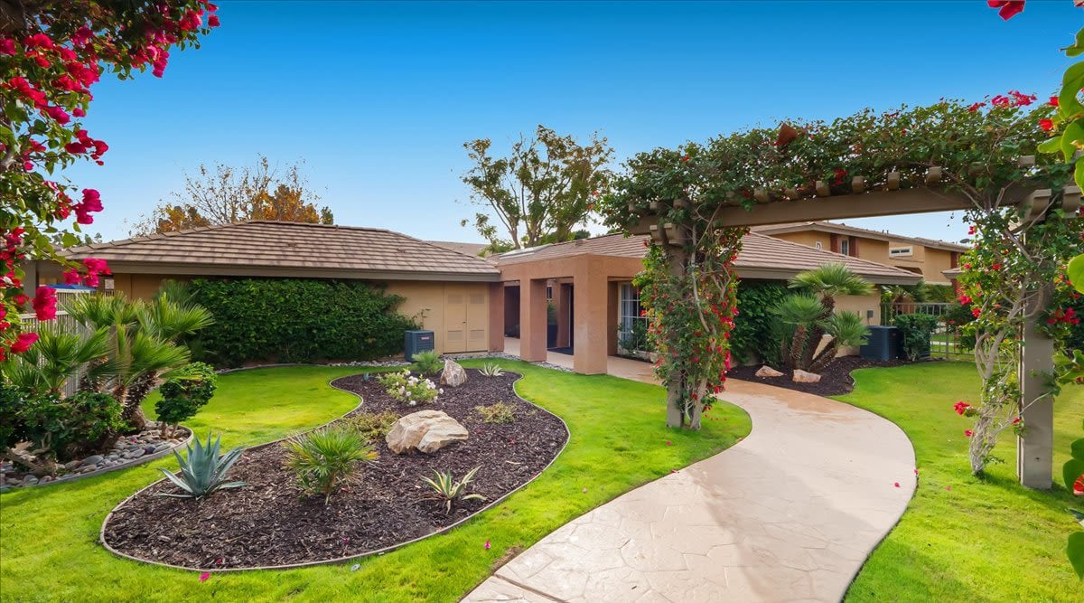 Outdoor walkway into entrance at  Mirabella Apartments in Bermuda Dunes, California