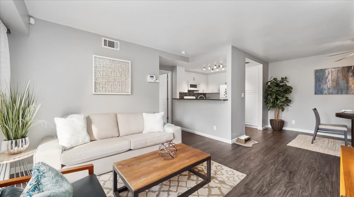 Furnished living room in model home at  Mirabella Apartments in Bermuda Dunes, California