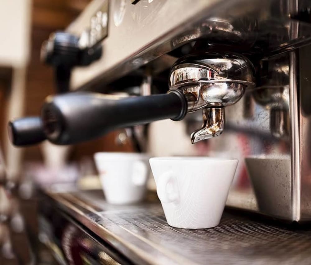 Espresso machine at a coffee shop near GrandeVille at Malta in Malta, New York