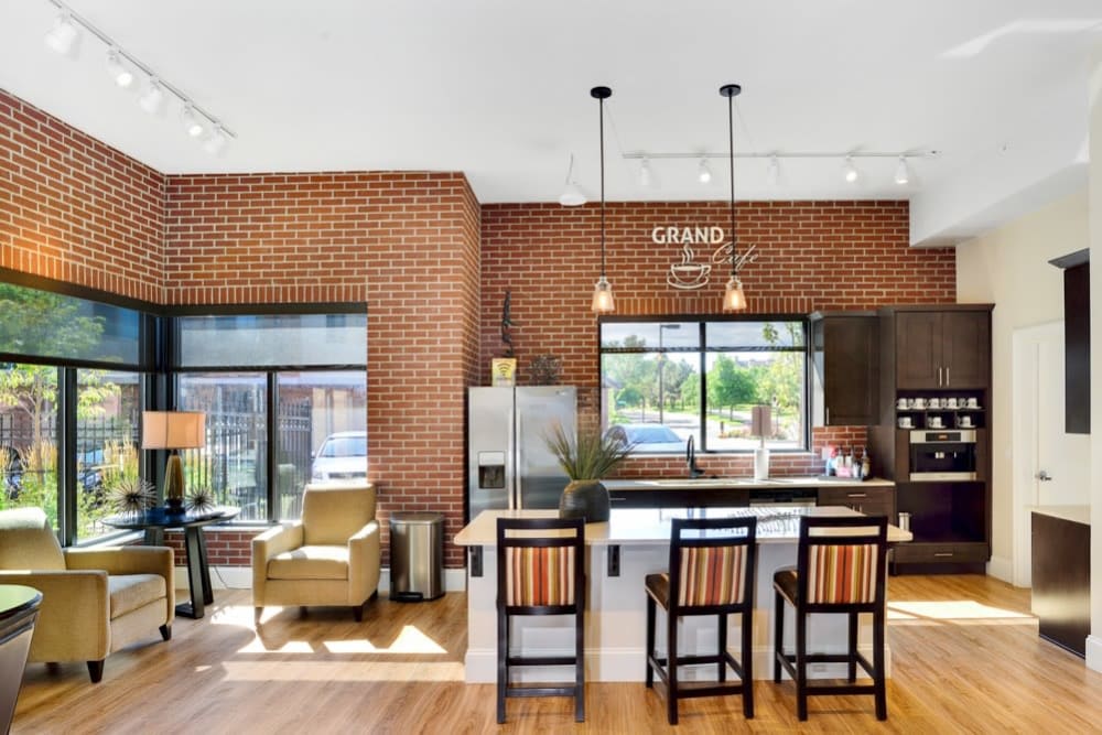 Resident clubhouse with refreshment bar at The Parc at Greenwood Village in Greenwood Village, Colorado