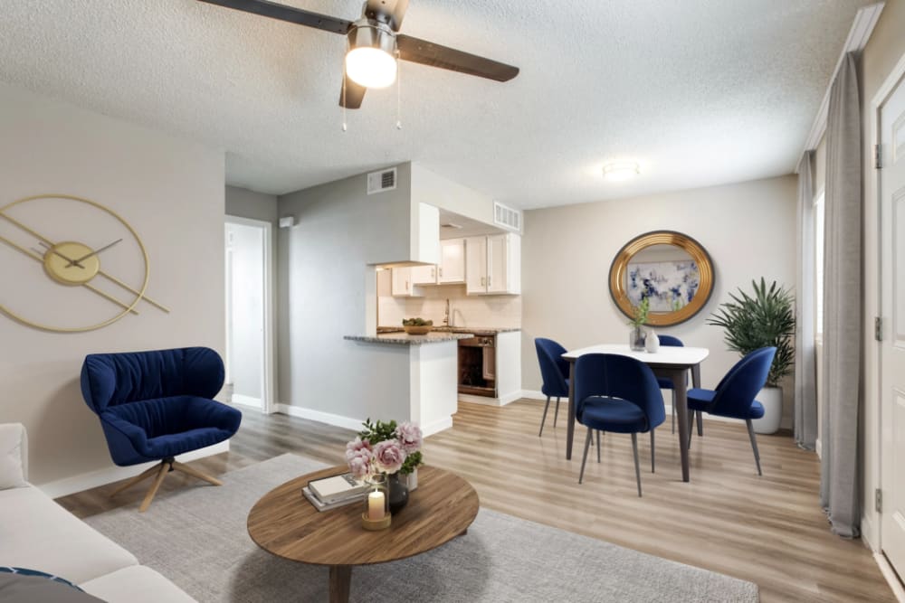 Living room with view of dining and kitchen at Villa De Oro in San Antonio, Texas