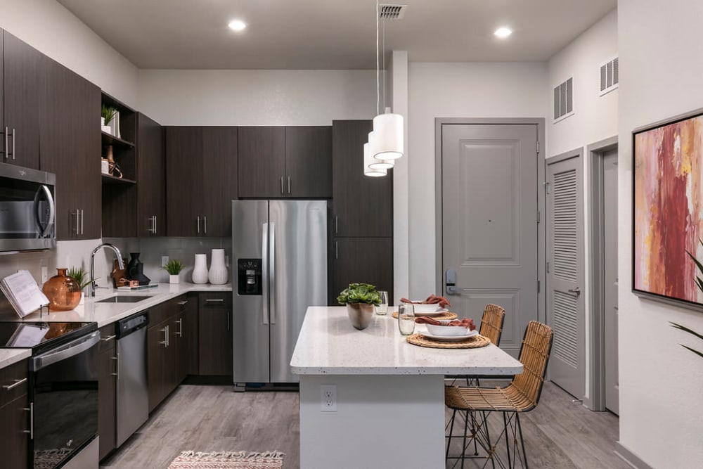 Shiny and well-organized kitchen at Integra Crossings in Sanford, Florida