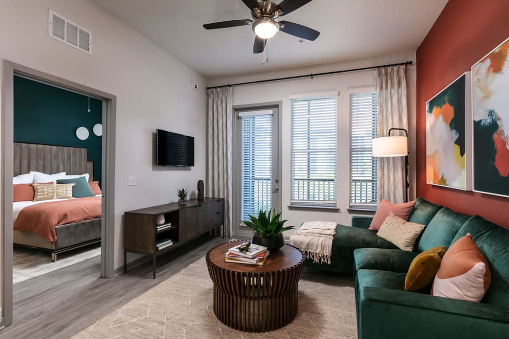 Cozy living area with bedroom view at Integra Crossings in Sanford, Florida