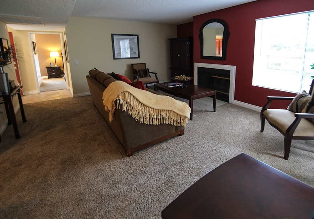 Living room with fire place at Shadowridge Summerwind in Vista, California