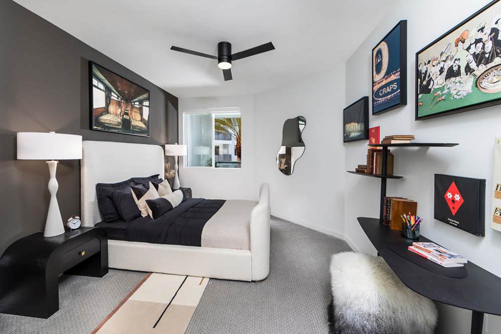 Bed room with statement color wall at The Ellison in Las Vegas, Nevada