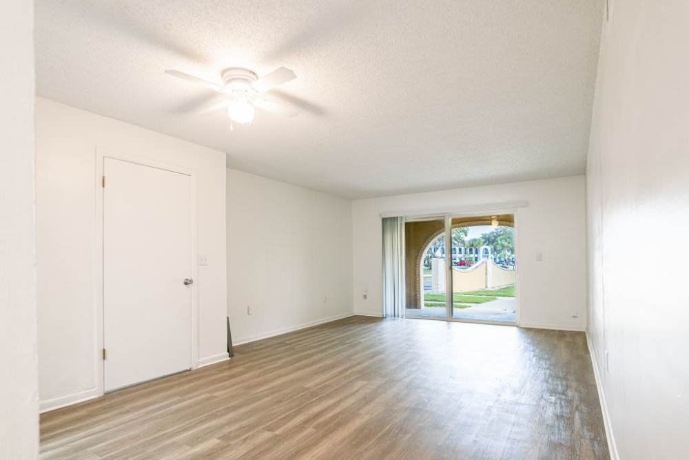 Living room with access to the private patio at San Jose in Winter Park, Florida