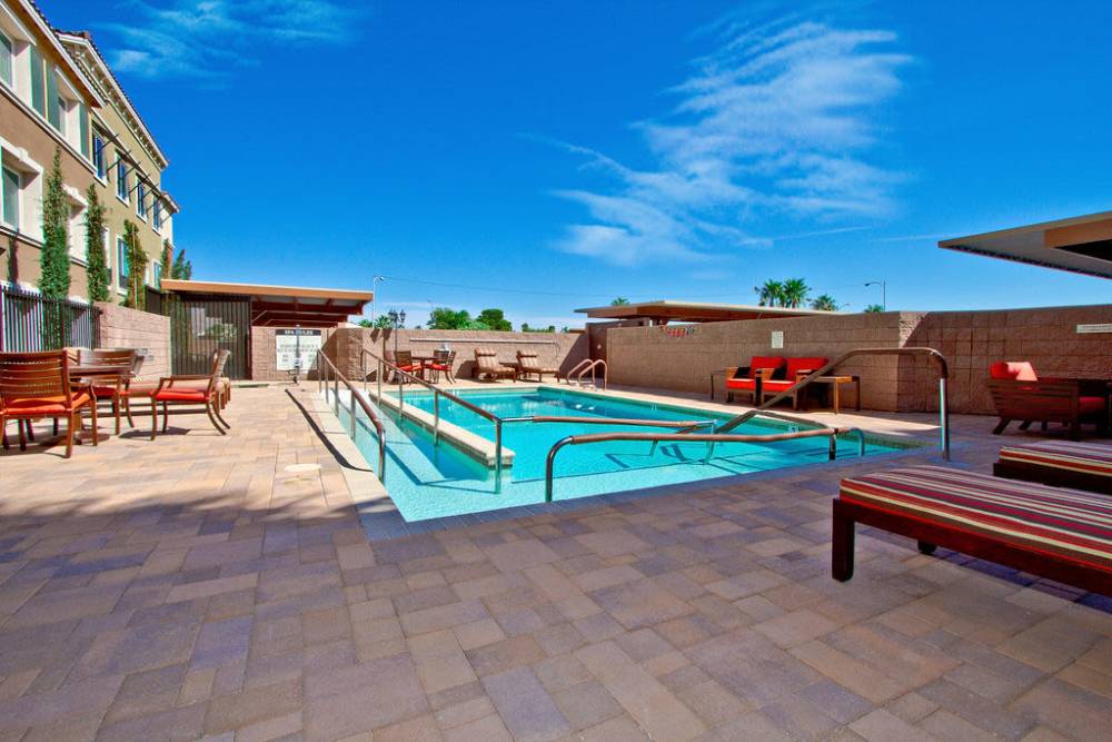 Pool with lounge beds at Acapella in Las Vegas, Nevada